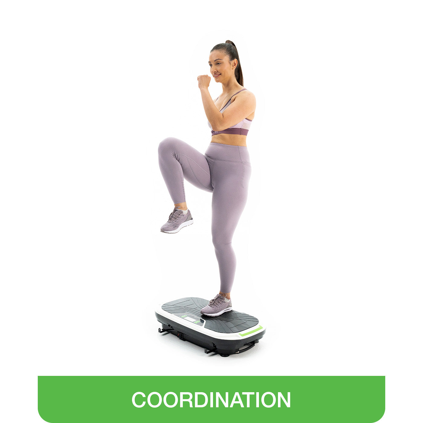 woman doing coordination exercise on vibrating exercise machine