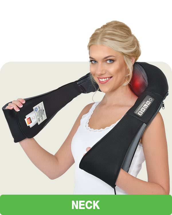woman using electric massager on her heck