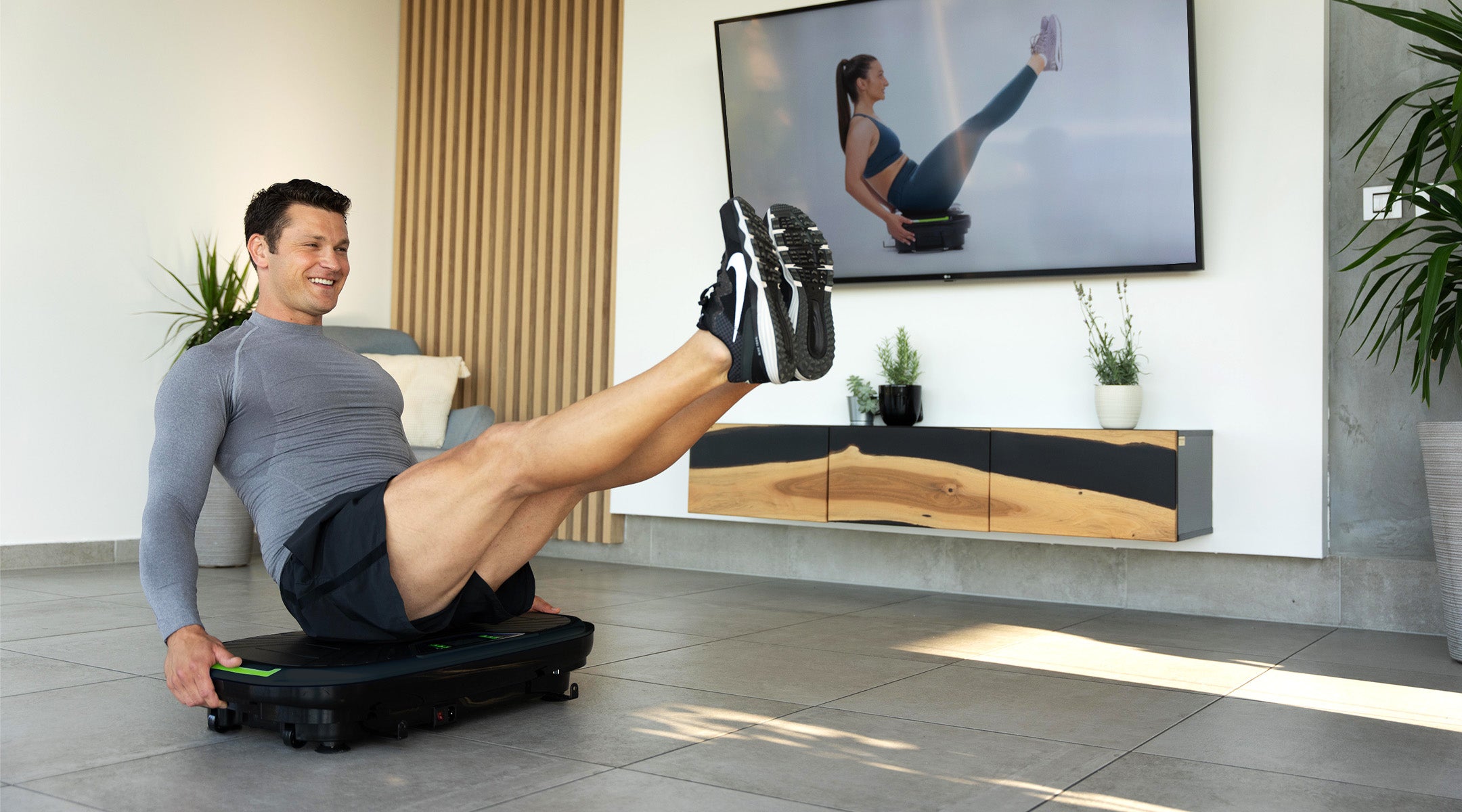 Entraînement à domicile sur la plateforme vibrante et oscillante Multiplate Sport